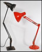Two vintage 20th century industrial Anglepoise lamps to include a black Herbert Terry raised on