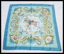 A vintage Hermes ' Cheval Turc ' silk scarf, originally designed by Christiane Vauzelles in 1969, in