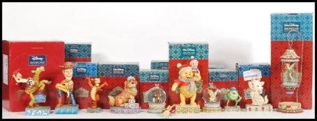 A selection of Disney Showcase figurines to include a 'Shining Sprite' Tinkerbell suspended in