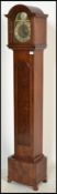A good quality walnut cased tempus fugit grandmother clock. The walnut trunk and hood with inset