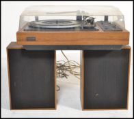 A retro 20th Century Prinz Allegro 2000 music entertainment player, lift up perspex top revealing