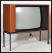 A vintage retro 20th century Bang and Olufsen B&O Beovision 9000 television TV raised on black metal