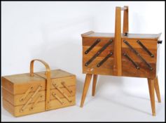 A pair of vintage 20th century wooden sewing boxes to include a Australian walnut wood box raised on