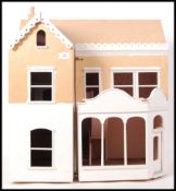 CONTEMPORARY PART FINISHED DOLLS HOUSE WITH SHOP FRONT
