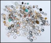 A large collection of costume and dress jewellery rings, to include white and gold metal rings,