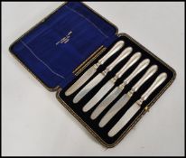 An early 20th century silver hallmarked set of six knives complete in fitted case by Allen & Darwin.