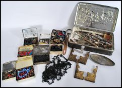 A collection of vintage 20th Century buttons and sewing accessories together with a collection o