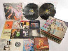 Vinyl Records - A collection of vinyl long play / LP's together with 45 rpm 7