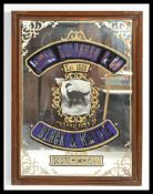 A vintage pub advertising point of sale mirror for James Buchanan & Co Black and White Whisky,