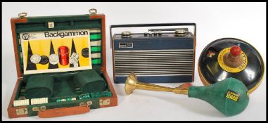 A group of vintage items to include cased backgammon set, car horn, Hacker Radio etc.
