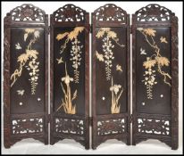 A Victorian 4 folding Chinese chinoserie and red lacquer  table top discretion screen inset with