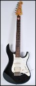 A vintage 20th century Yamaha Pacifica electric six string guitar having a black body with white