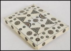 A 19th century Anglo Indian ivory Vizagapatam calling card case having micro mosaic stone inlay