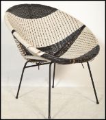 A retro 20th Century satellite sputnik atomic chair in white and black weave raised on ebonized