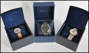 A group of three dress watches to include Hugo Boss, Cluse and an Armani Exchange, all three watches