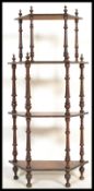 A 19th Century Victorian walnut etagere four tier