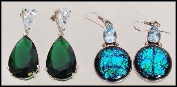 A pair of silver 925 dress drop earrings, mother of pearl translucent drop surmounted with a tear