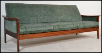 A  retro 20th Century circa 1970's Greaves and Thomas teak open framed upholstered sofa / day bed,