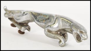 An original vintage chrome Jaguar car bonnet mascot ' Leaping Jaguar '. Code marks to underside.