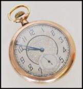 A 20th century yellow metal Waltham pocket watch with engraved floral detailing to the case,