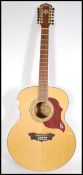 A vintage retro Washburn Cumberland 12 string acoustic guitar musical instrument having a shaped