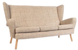 ORIGINAL 1950'S WINGED BACK SOFA IN THE MANNER OF HOWARD KEITH