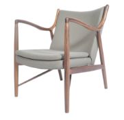 AFTER FINN JUHL A CONTEMPORARY WALNUT ACCENT CHAIR