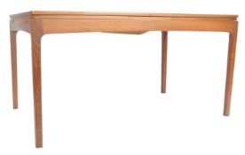 A DANISH TEAK WOOD EXTENDING DINING TABLE BY BORDUM OG NIELSEN