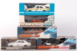 COLLECTION OF VINTAGE BOXED FORD ESCORT SCALEXTRIC SLOT RACING CARS