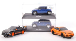 TWO SCALEXTRIC 1:32 SCALE SLOT RACING CARS - MINI COOPERS