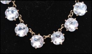 Two pairs of 925 silver earrings set with white stones having post backs together with a rock