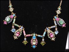 A 1950s signed Hollycraft gold-tone parure consisting of necklace, bracelet, earrings and brooch set