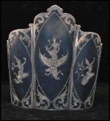 A 1940s wide 9 link Siamese silver bracelet etched with deities including Mekhala goddess of