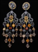 A pair of vintage Askew of London silver-tone chandelier earrings decorated with maple leaves,
