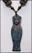 A 1930s Czech Neiger brothers Egyptian revival black glass filigree encased knotted bead sautoir