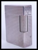 A vintage 20th century DuPont lighter bp2489 havin