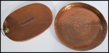 A 19th century copper charger / decorative plate w