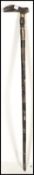A vintage 20th century horn walking cane stick hav