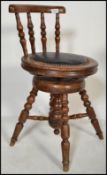 A 19th century mahogany artist revolving stool wit