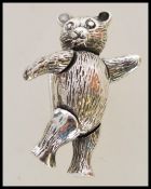 A 925 stamped silver bear brooch with articulated