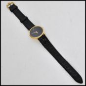 A Raymond Weil gents 18ct gold plated watch having