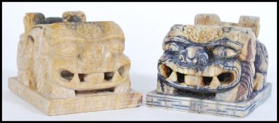 A pair of 19th century Chinese soapstone brush pot