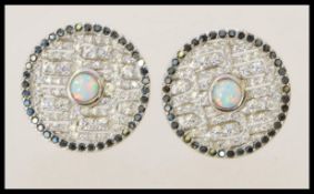 A pair of stamped 925 silver earrings of round for