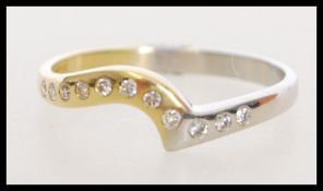 A 20th century hallmarked 18ct gold and diamond ri