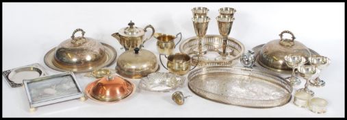 A collection of silver plated items to include sil