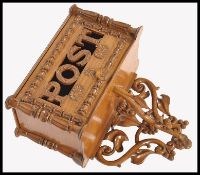 A 19TH CENTURY VICTORIAN COUNTRY HOUSE OAK POST LETTER BOX