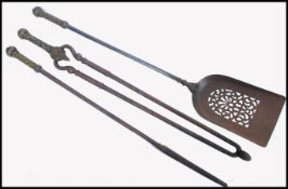 18TH / 19TH CENTURY BRASS & CAST IRON FIRESIDE COMPANION SET