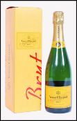 A BOTTLE OF VEUVE CLICQUOT PONSARDIN BRUT CHAMPAGNE IN PRESENTATION BOX