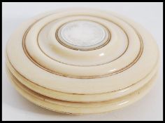 TURNED IVORY & SILVER MOUNTED VICTORIAN TOY YO-YO OF ROUNDEL FORM