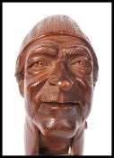 PAIR OF 19TH CENTURY SWISS WOODEN NUTCRACKERS - DIABLERETS